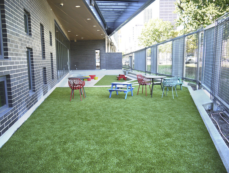 Playground Grass synthetic turf installed at Dayton Metro Library by ForeverLawn of Ohio