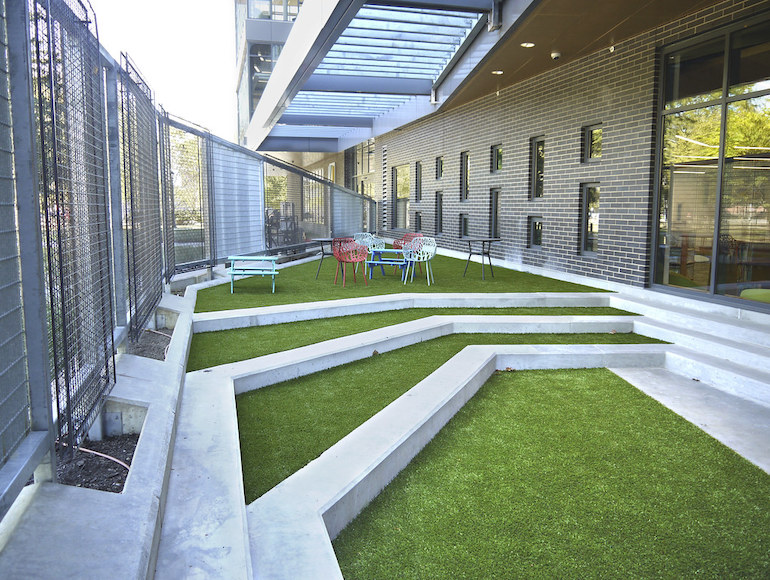 Playground Grass synthetic turf installed at Dayton Metro Library by ForeverLawn of Ohio