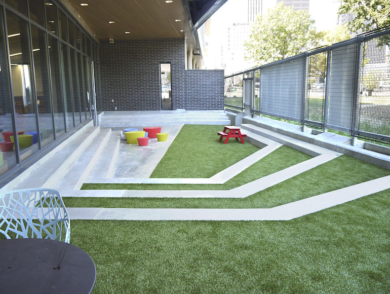Playground Grass synthetic turf installed at Dayton Metro Library by ForeverLawn of Ohio