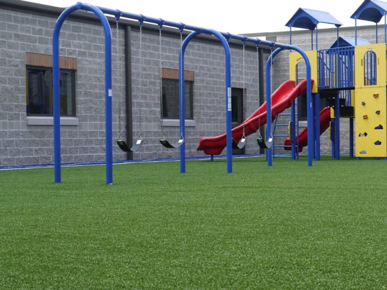 Blackhawk Christian School playground with four square court designed into Playground Grass® Academy installed by ForeverLawn of Ohio