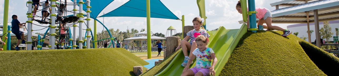 Kids playing on PG grass mound