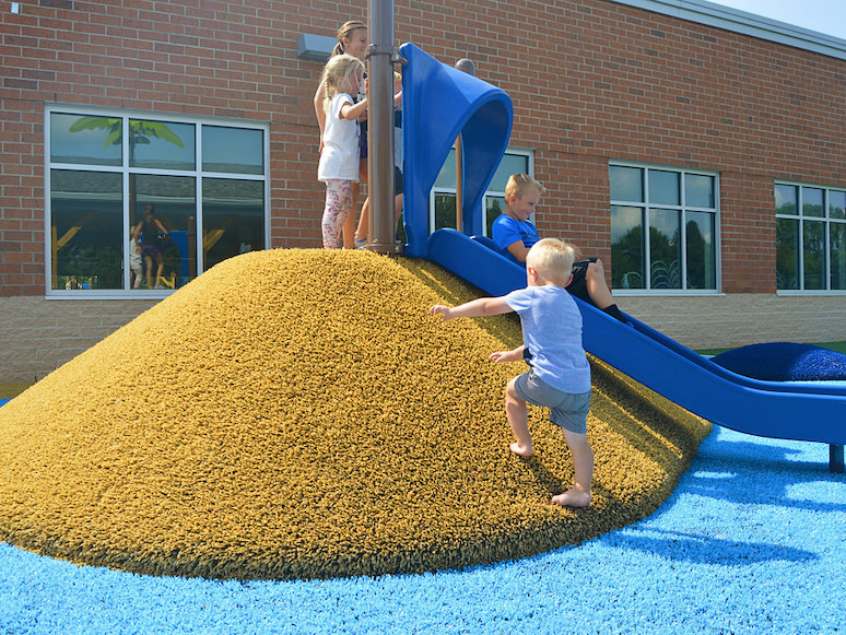 Lake YMCA featuring ForeverLawn synthetic grass installed by ForeverLawn NEO
