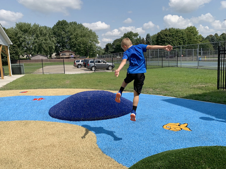 Lake YMCA featuring ForeverLawn synthetic grass installed by ForeverLawn NEO