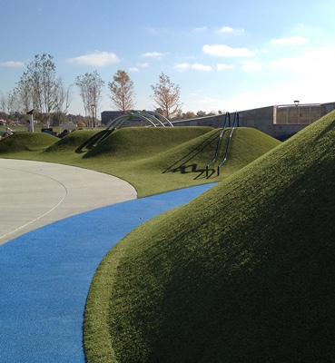 PlayMounds at Summit Park in Blue Ash, Ohio featuring Playground Grass synthetic turf by ForeverLawn PlayMounds at Summit Park in Blue Ash, Ohio featuring Playground Grass synthetic turf by ForeverLawn