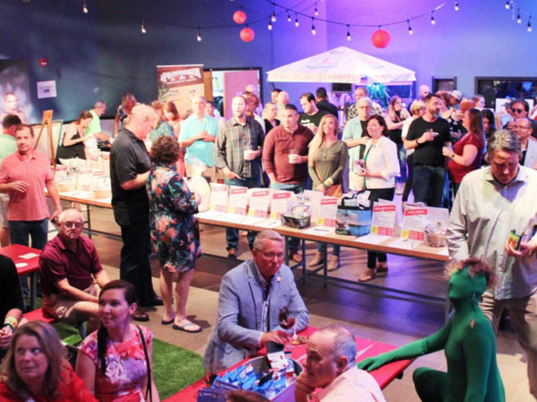 Arts on Tap fundraising event in Fort Myers, Florida, featuring artificial grass by ForeverLawn